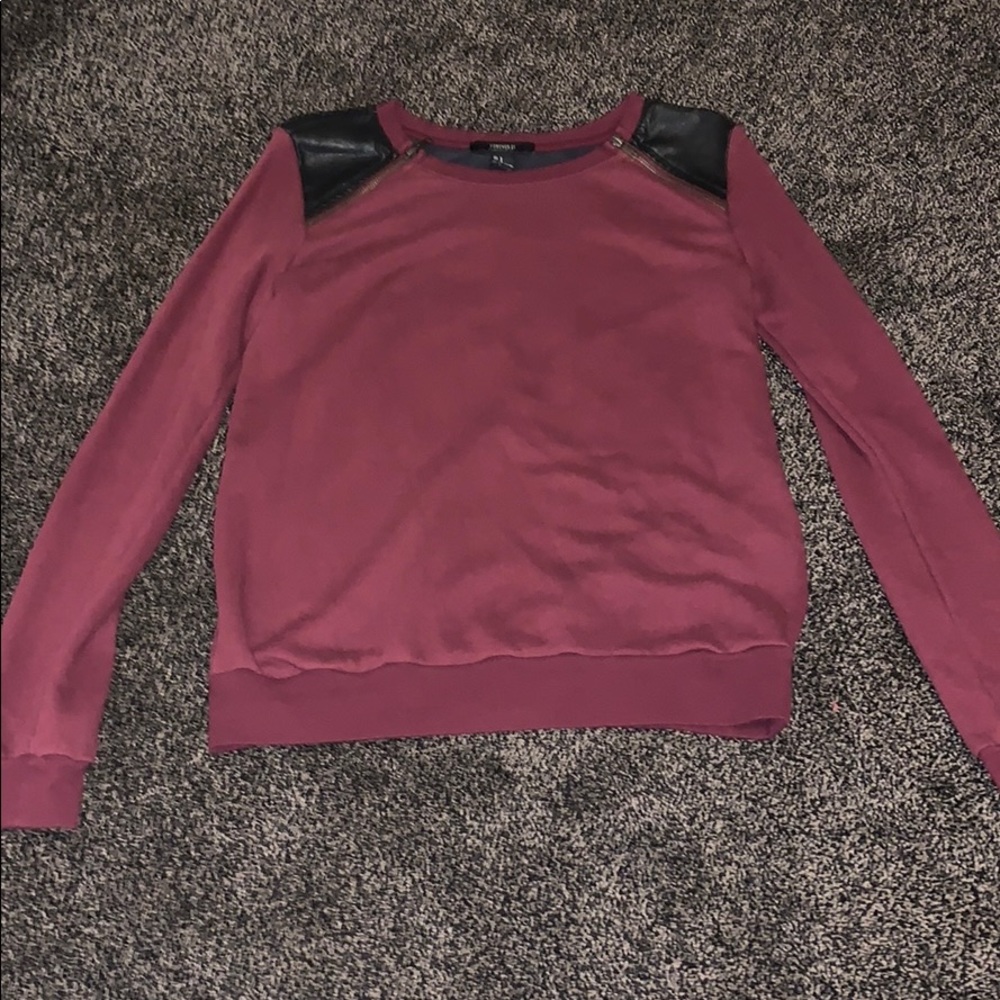 A leather top sweater